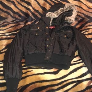 Black jacket with furry hoodie.